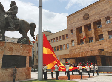 Ceremonial flag change in front of the Assembly of the Republic of Macedonia. Photo: Kosta Stamatovski.
